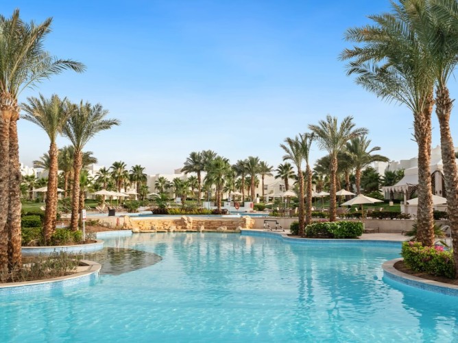 Swissôtel Sharm El Sheikh All Inclusive Collection - Zona de piscine a Swissôtel Sharm El Sheikh All Inclusive Collection oferă o varietate largă de piscine cu adâncimi diferite, situate în grădini tropicale luxuriante.